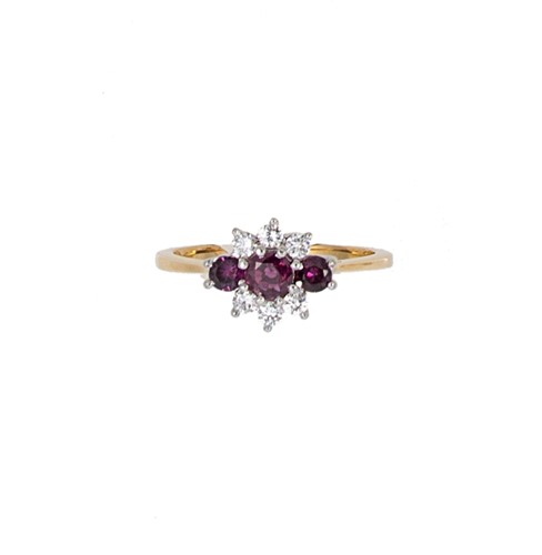 Lot 67 - A ruby and diamond cluster ring