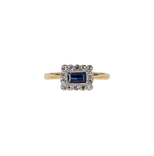 Lot 54 - A sapphire and diamond panel ring