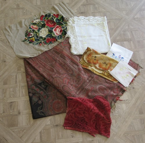 Lot 286 - A Victorian paisley wool shawl; two early 20th...