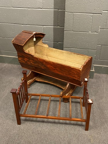 Lot 609 - Continental 19th century child's rocking...