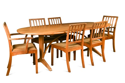 Lot 332 - Edward Barnsley CBE (1900-1987) and The Barnsley Workshop, a large walnut dining table and eight chairs