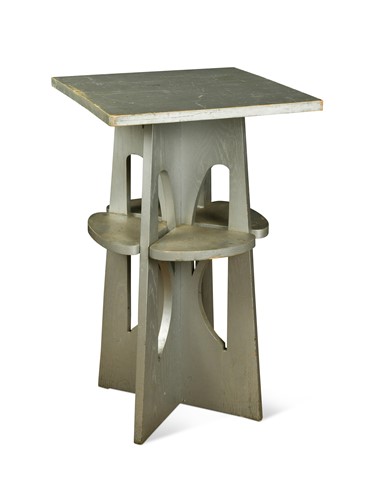 Lot 474 - In the manner of John Ednie, a silver painted oak 'Domino' side table