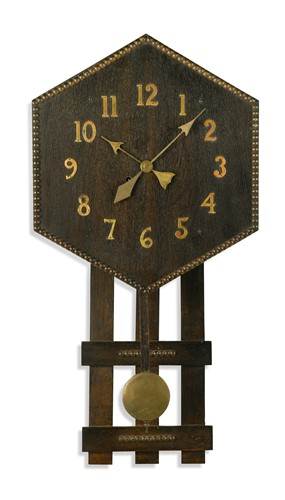 Lot 482 - An Arts & Crafts oak wall clock