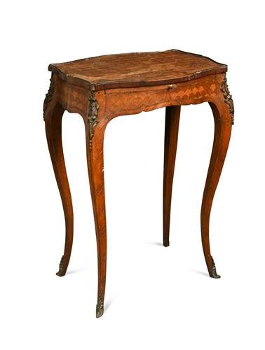 Lot 555 - A French Louis XV style fish-scale parquetry side table