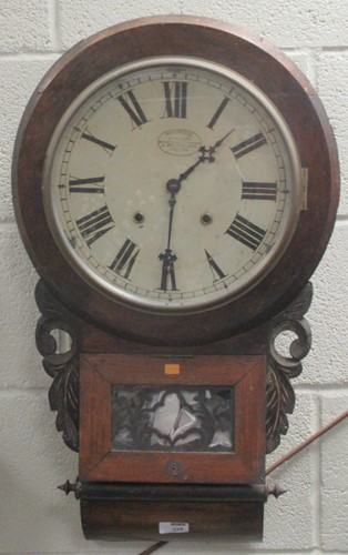 Lot 229 - An oak and mahogany case wall clock, Mober...