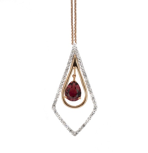 Lot 133 - A tourmaline and diamond pendant and chain