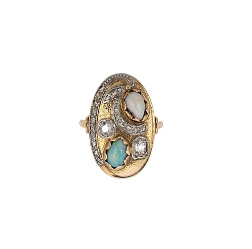 Lot 50 - An opal and diamond dress ring