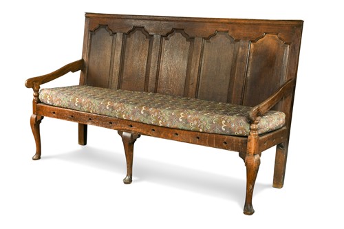 Lot 284 - An oak panel backed settle, 18th century