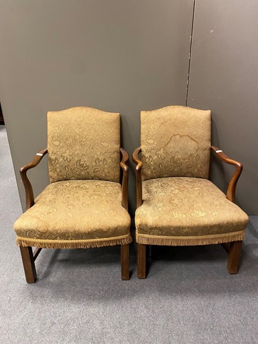 Lot 479 - A pair Gainsborough type elbow chairs...