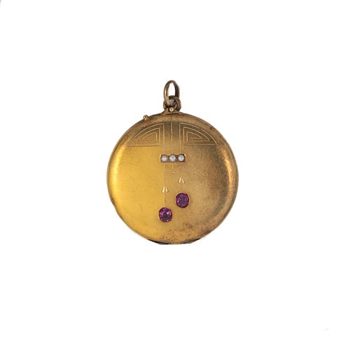 Lot 65 - An early 20th century ruby and split pearl locket