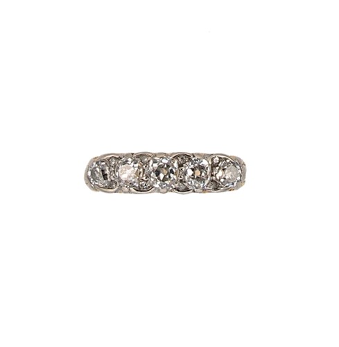 Lot 130 - A Victorian diamond set carved half hoop ring