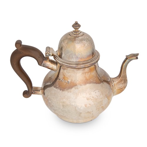 Lot 330 - A George V Britannia silver coffee pot