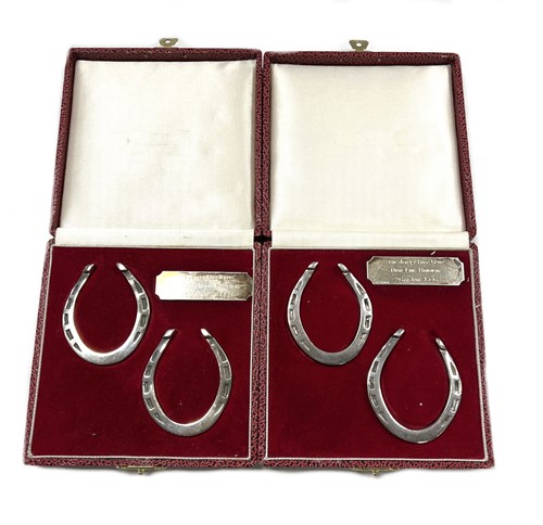 Lot 225 - A set of four Elizabeth II silver novelty napkin rings
