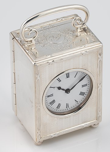 Lot 243 - An Edward VII silver cased boudoir clock