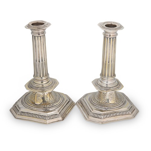 Lot 293 - A pair of Queen Anne Britannia silver candlesticks