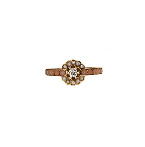 Lot 78 - A diamond and coral cluster ring