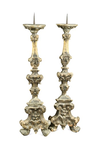Lot 273 - A pair of carved wood pricket candlesticks, 18th century