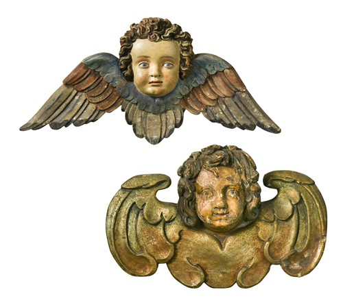 Lot 272 - A large carved giltwood and painted head of an angel, 18th century