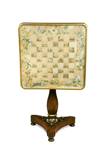 Lot 379 - A William IV rosewood table with chequer board top