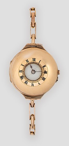 Lot 180 - An early 20th century 9ct gold half hunter wristwatch