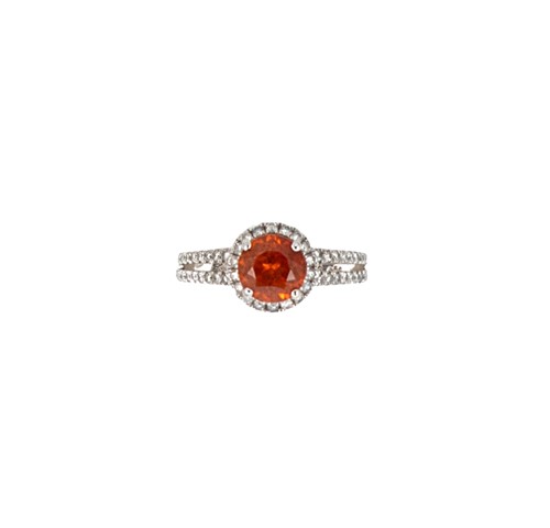 Lot 61 - A spessartine garnet and diamond halo style ring