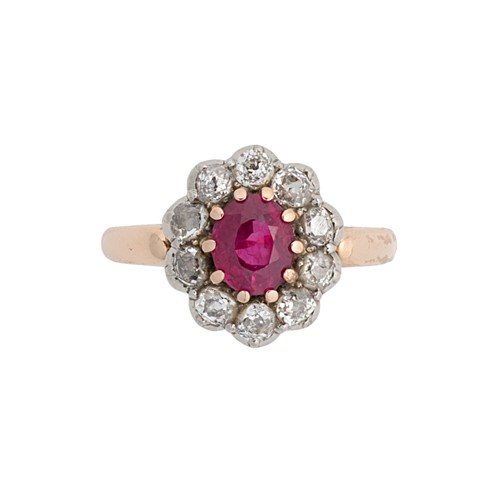 Lot 135 - An 18ct gold ruby and diamond cluster ring
