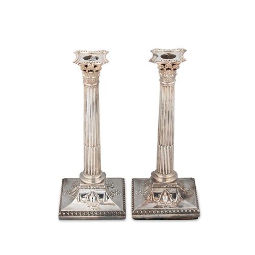 Lot 298 - A pair of George III 18th century silver candlesticks