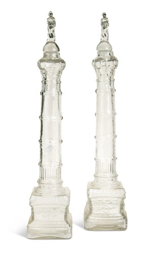 Lot 486 - A pair of French glass bottles and stoppers, early 20th century
