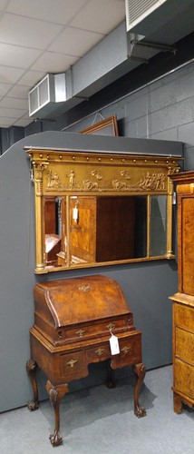 Lot 580 - A Regency giltwood and gesso triple plated overmantel mirror