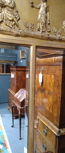 Lot 580 - A Regency giltwood and gesso triple plated overmantel mirror