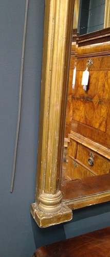 Lot 580 - A Regency giltwood and gesso triple plated overmantel mirror