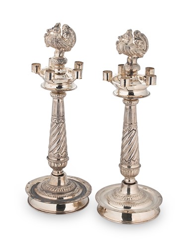 Lot 284 - A pair of late 20th century (probably) Indian metalwares candlesticks