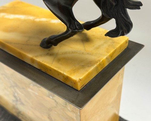 Lot 515 - A patinated bronze model of Napoleon on horseback, late 19th century