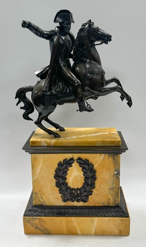 Lot 515 - A patinated bronze model of Napoleon on horseback, late 19th century