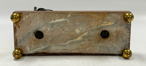Lot 529 - A bronze model of the recumbent Napoleon resting his foot on a barrel, French School, 19th century
