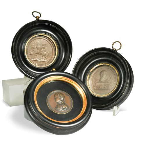 Lot 520 - A group of three Napoleonic medallions, 19th century
