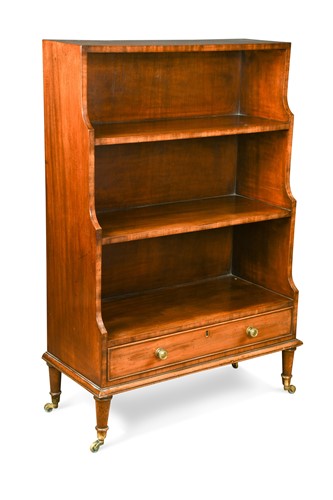 Lot 413 - A George III style mahogany waterfall three-tier open bookcase