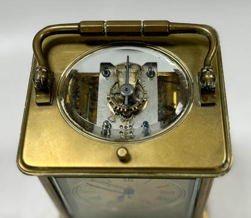 Lot 509 - A French brass repeating carriage clock stamped for E. Maurice & Co., late 19th century