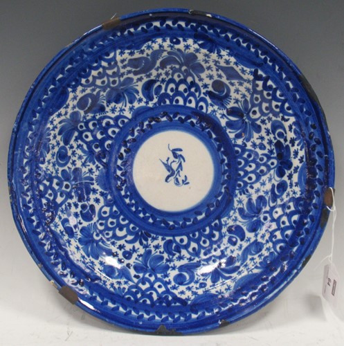 Lot 64 - An Italian faience pottery blue and white...