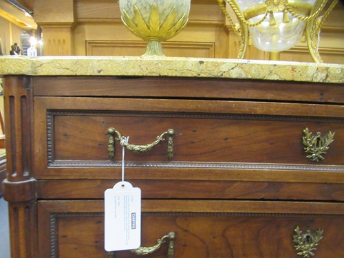 Lot 562 - A French Louis XVI fruitwood marble topped commode