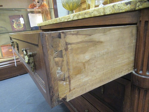 Lot 562 - A French Louis XVI fruitwood marble topped commode