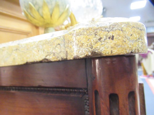 Lot 562 - A French Louis XVI fruitwood marble topped commode