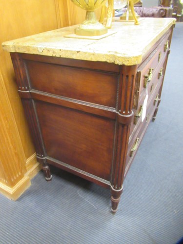 Lot 562 - A French Louis XVI fruitwood marble topped commode
