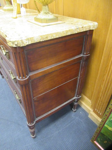 Lot 562 - A French Louis XVI fruitwood marble topped commode