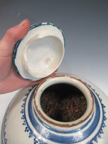 Lot 10 - A blue and white glazed ovoid vase decorated...