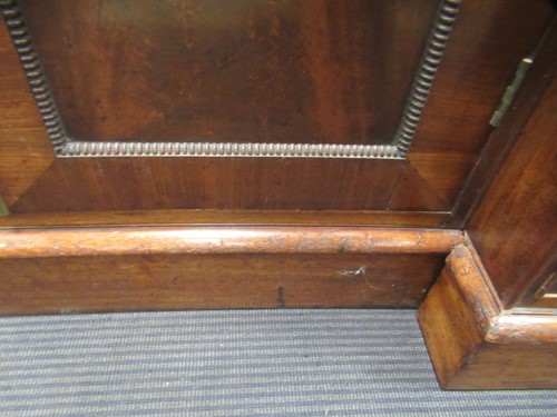 Lot 513 - A mahogany breakfront library bookcase, early 19th century