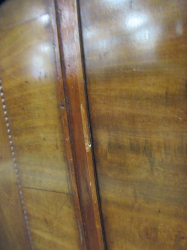 Lot 513 - A mahogany breakfront library bookcase, early 19th century