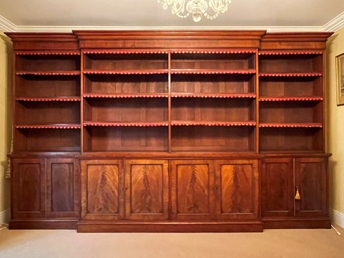 Lot 513 - A mahogany breakfront library bookcase, early 19th century