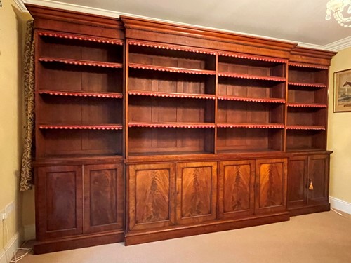 Lot 513 - A mahogany breakfront library bookcase, early 19th century