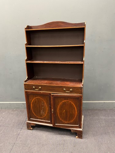 Lot 337 - A Regency style mahogany waterfall bookcase...